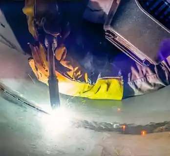 FCAW Welding while laying on stomach.