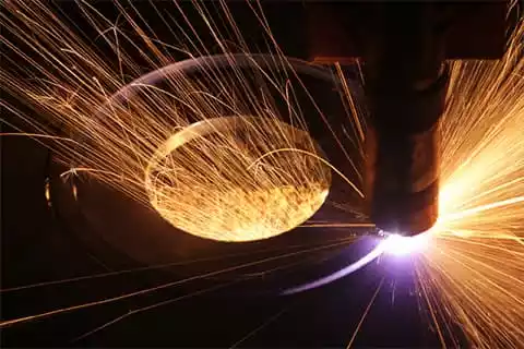 FCAW Welding a pipe.