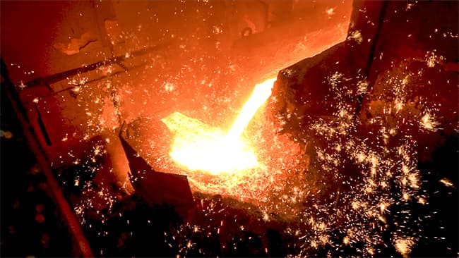 Pouring Molten Metal in Foundry.