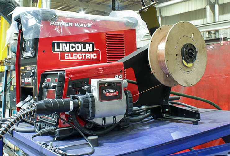Lincoln Electric welding station with a spool of welding wire attached.